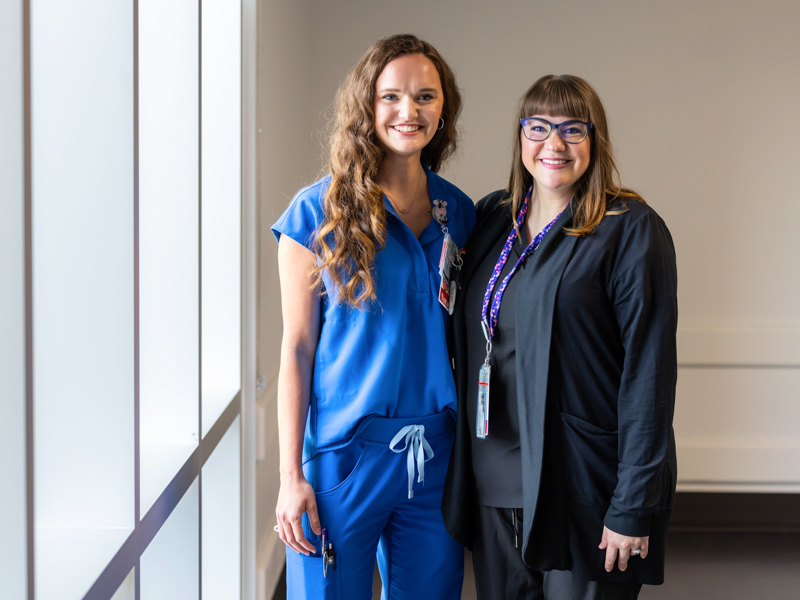 RN Abby McCardle, left, was once the patient of her nurse educator, Brittany Adams.