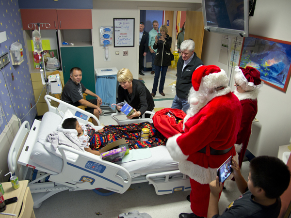 Santa, Gov. Bryant, entourage of elves bring Christmas to Batson patients