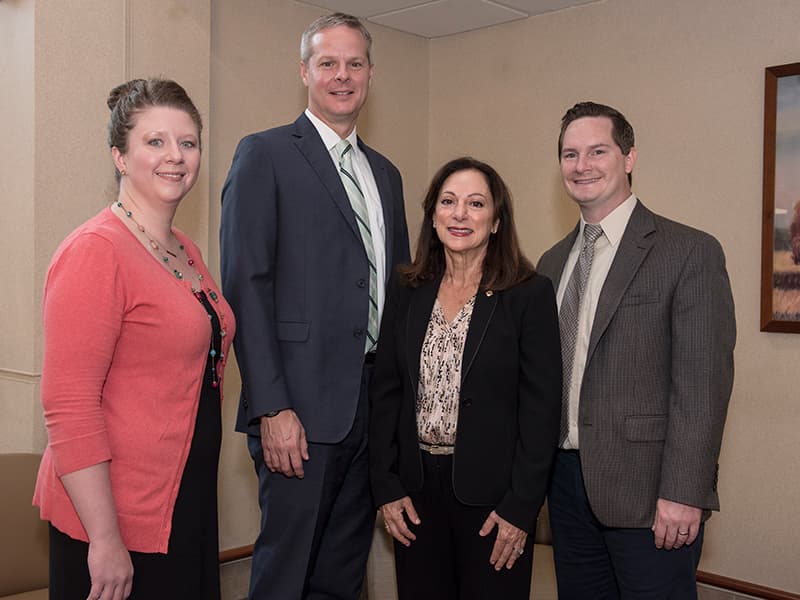 The CHDP team from UMMC includes, from left, clinical lead for developmental pediatrics Dr. Barbara Saunders, clinical lead for psychology Dr. David Elkin, principal investigator Dr. Susan Buttross and Dr. Dustin Sarver, UMMC director of workforce training. Dr. Robert Annett, CHDP research director, is not pictured.
