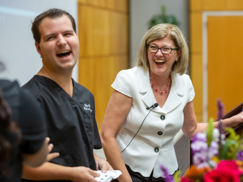 First-year dental student Kyle Alford learns the joke's on him during an exercise led by author Sonja Lauren.
