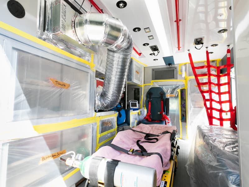Inside of ambulance retrofitted for COVID-19 patient transport