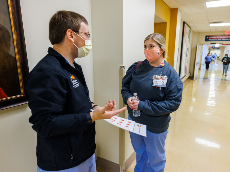 Nurse Brad Vanlandingham talks with nurse Lauren Vanderford about patient safety during Children's of Mississippi's first hospital-wide Hand Hygiene Stand-down.