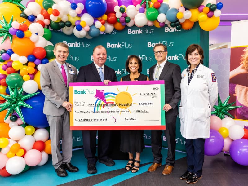 Celebrating BankPlus' commmitment to helping Children's of Mississippi through Friends of Children's Hospital are, from left, Children's of Mississippi CEO Guy Giesecke; BankPlus President and CEO Bill Ray; Ray's wife, Sara, a 17-year board member and former board chair of Friends of Children's Hospital; Rob Armour, BankPlus executive vice president and chief marketing and product development officer; and Dr. Mary Taylor, Suzan B. Thames Chair and professor of pediatrics.