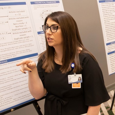 SON Research Day participant explains research.