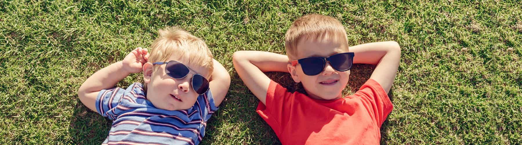 two children wearing sunglasses