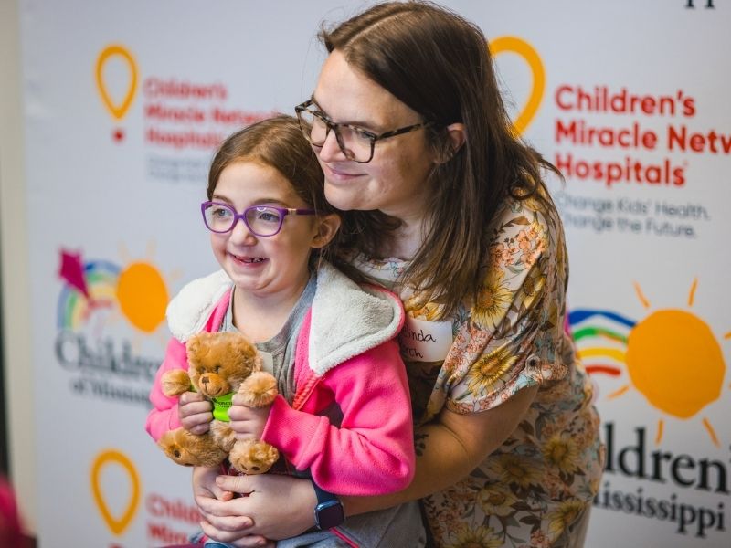 Children's of Mississippi patient Emma Kate Porch of Brandon gets a hug from mom Melinda.