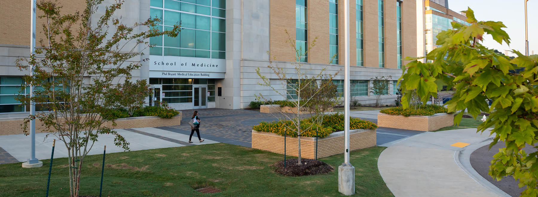 An exterior shot of the School of Medicine building on the campus of UMMC