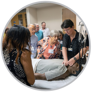 Group working with SIM patient.