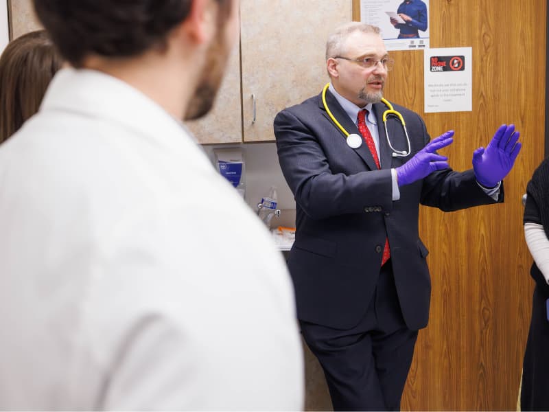 Dr. Pawel Pomianowski gestures with his hands.