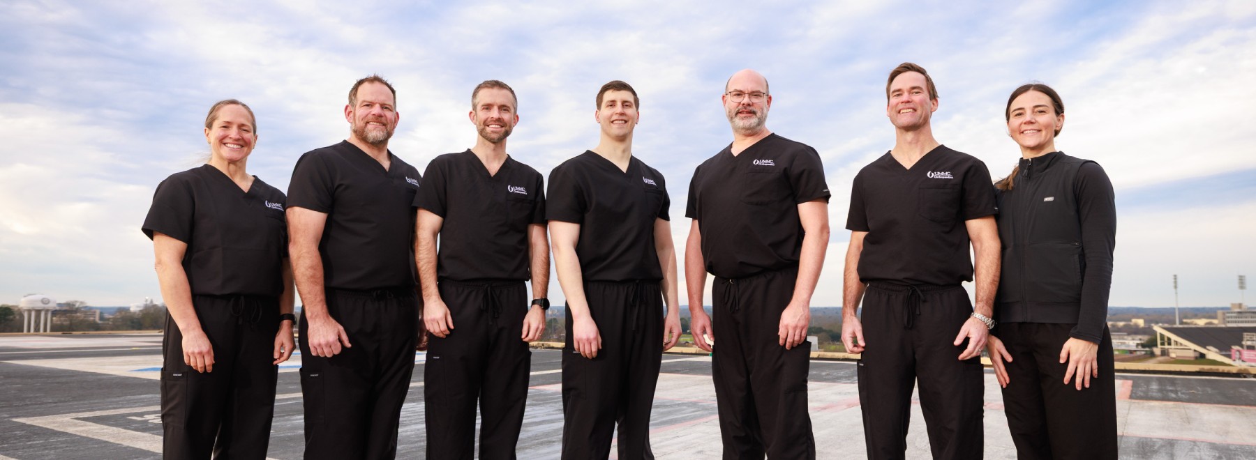 Orthopaedic Trauma Team poses for group photo on UMMC's helipad.