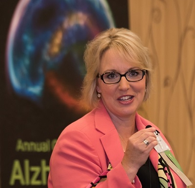 A female speaks during an Alzheimer's conference