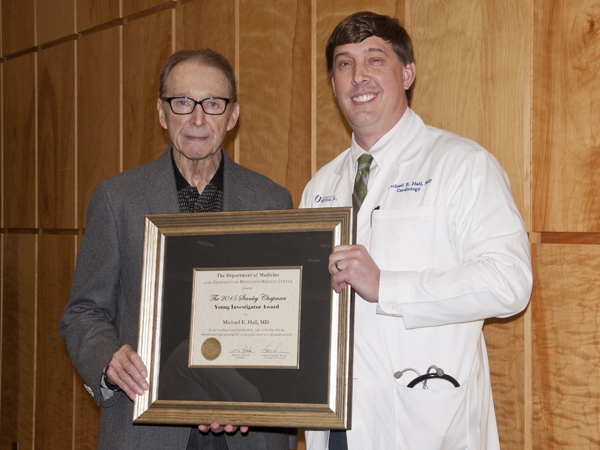 Dr. Stanley Chapman, left, professor emeritus of  infectious diseases at UMMC, poses with Dr. Michael Hall, the first recipient of the Stanley Chapman Young Investigator Award during the 2015 Department of Medicine Research Day event.