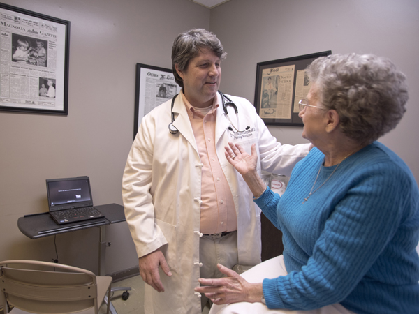 As with many physicians, Lampton says that spending time with patients like Tommie Beck of Magnolia is where he finds joy in the practice of medicine.