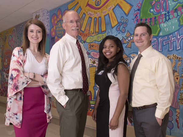 The UMMC SPARK team from left, research coordinator Kristen Callahan, Annett, research coordinator Sabrina White and assistant professor of pediatrics Dr. Dustin Sarver.
