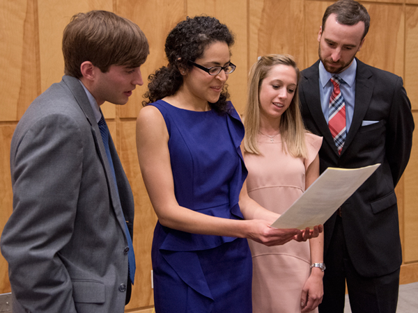 Christine Hayden is sworn in as secretary during the 2015 ASB Officer Installation Banquet May 4, 2015. From the left are Chris Price, D3, treasurer; Sara Ali, M3, president; Hayden; and Jeff Peeples, M3, vice-president.