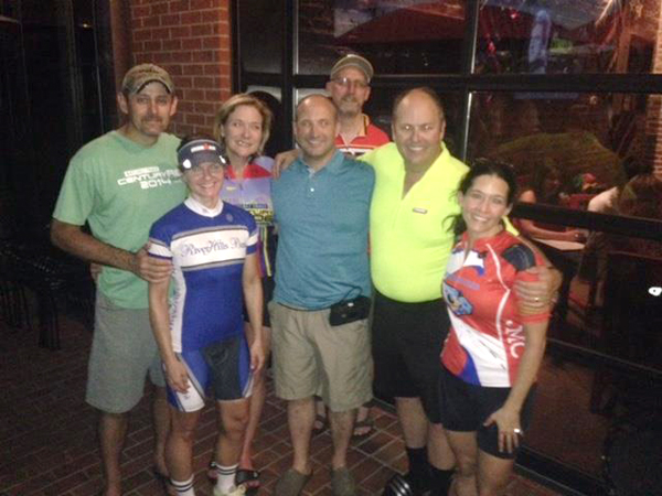 Fellow bicyclists who helped save the life of David Lindsey, center, include, from left, Randy Tackett, Denise Mills, Jill Warner, Rik Tice, T. Logan Russell and Alyssa Silberman.