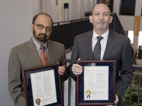 Patent recipients Dr. Parminder Vig and Dr. Wael ElShamy.