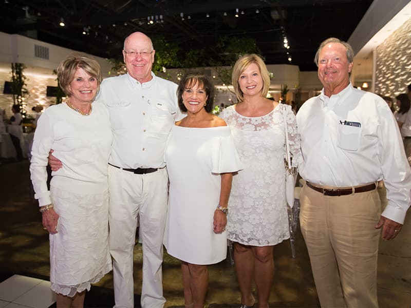 Smiling over a successful BankPlus Presents Enchanted Evening fundraiser are, from left, Suzan Thames, Dr. James Keeton, Sara Ray, Dr. LouAnn Woodward and Sidney Allen.