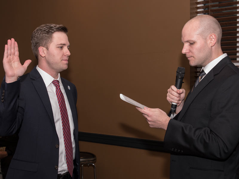 Thomas, left, was sworn in as the new ASB by former president Brock Banks, a fourth-year medical student, at a dinner ceremony in May of this year.