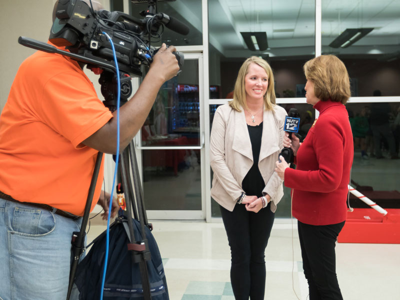 Melanie Christopher of WJTV interviews Friends of Children's Hospital board member Jill Dale prior to the start of BankPlus Presents Light A Light. The event is the nonprofit's oldest fundraiser.