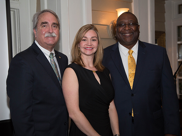 Deming-Jefcoat with Dr. David Felton (left), Dean of the School of Dentistry, and Dr. Acie Whitlock (right), current Dental Alumni Board President at the Dental Alumni and Friends dinner Friday, February 10.