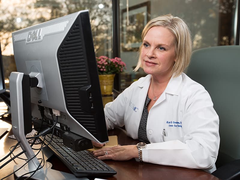 Kristi Goodson, a nurse practitioner with UMMC Telehealth, shows how she would see and talk with a patient during an actual UMMC 2 You medical appointment using video-conferencing technology.