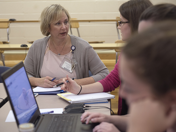Kathy Rhodes, assistant professor of nursing, left, is one of around 900 faculty members who were asked to participate in the 2016 Faculty Forward survey.