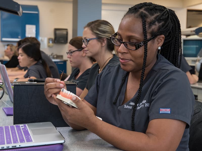 First-year dental student Jaleesa Dandridge capitalizes on some of the knowledge she gained during the Pre-Matriculation Summer Educational Enrichment Program, administered by the Office of Health Careers Opportunity for entering dental and medical students.