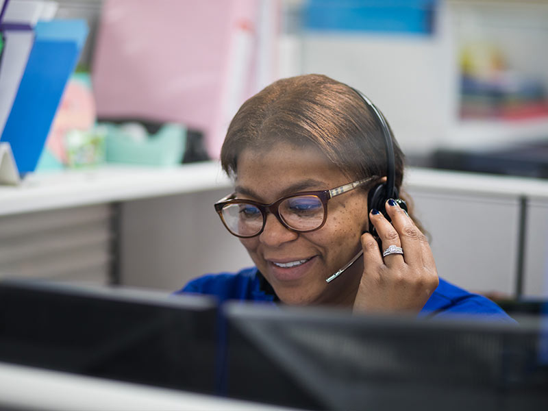 Physician scheduler Shameka Bailey-Ross takes a phone call at the new access center.