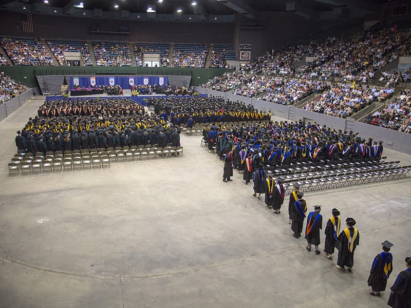 UMMC's Class of 2018 processes into the Mississippi Coliseum on the Fairgrounds in Jackson. Of this year's 930 graduates, 677 attended commencement to receive their diplomas.