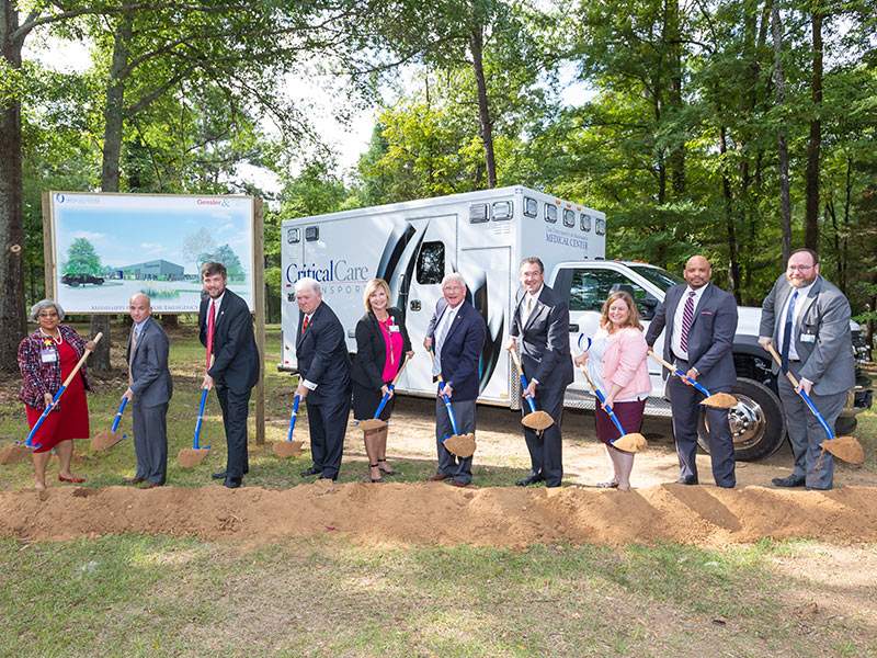 Taking part in the groundbreaking for the new Mississippi Center for Emergency Services building are, from left, Doris Whitaker, director of chaplain services; Dr. Alan Jones, professor and chair of the Department of Emergency Medicine; Dr. Damon Darsey, associate professor of emergency medicine and MCES medical director; former Gov. Haley Barbour; Dr. LouAnn Woodward, vice chancellor for health affairs; U.S. Sen. Roger Wicker; U.S. Rep. Gregg Harper; Aimee Meacham, chief of external affairs for BroadbandUSA; IHL Commissioner Dr. Al Rankins; and Dr. Jonathan Wilson, UMMC chief administrative officer.