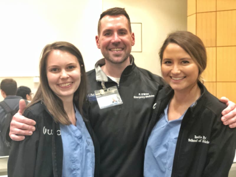At UMMC, O'Brien has discovered several of his former high school students working or studying here, including Griffith, left, and Bryd Hemphill, right.