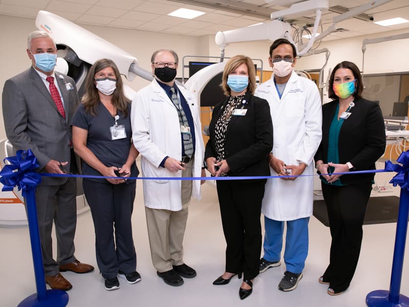 On hand for the Interventional Radiology Suite's ribbon-cutting ceremony are, from left, Britt Crewse, chief executive officer of UMMC's adult hospitals; Becky Wixson, cardio-interventional imaging supervisor; McCowan; Dr. LouAnn Woodward, UMMC vice chancellor for health affairs; Patel; and Ashley Jones Burns, imaging services director.