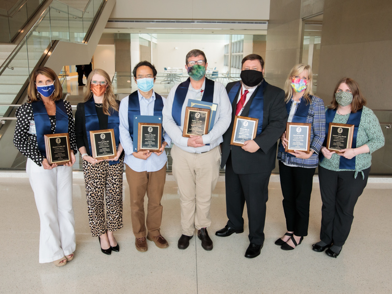 The 2021 Regions TEACH Prize finalists and their nominating schools are, from left: Dr. Elizabeth Franklin (SHRP), Dr. Lyssa Weatherly (SOM), Dr. Yuefeng Lu (SOD), Dr. Stephen Stray (SGSHS and SOM), Kenneth Holm (SOPH), Dr. Anne Norwood (SON), and Dr. Amanda Capino (SOP)