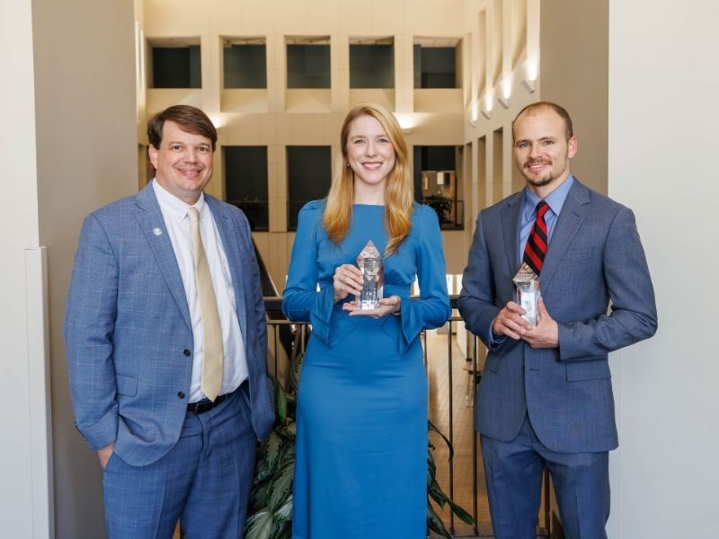 Early Career Investigator recipients include Dr. Lais Berro, center, and Dr. Alan Mouton, right. At left is Dr. Gene Bidwell.