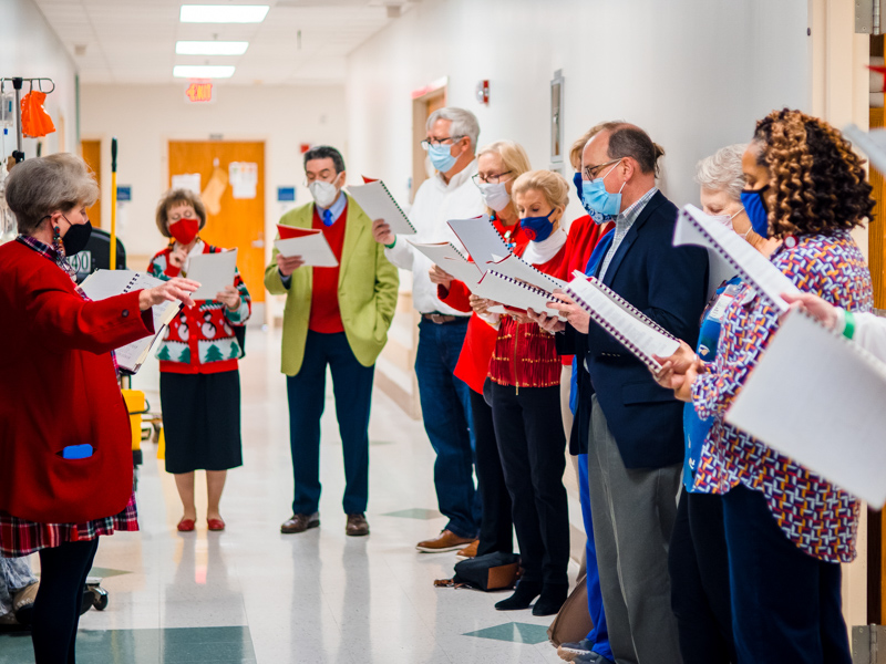 Patients and staff in the Bone Marrow Unit were treated to a special holiday visit when a group of carolers returned to UMMC for an 18th year.