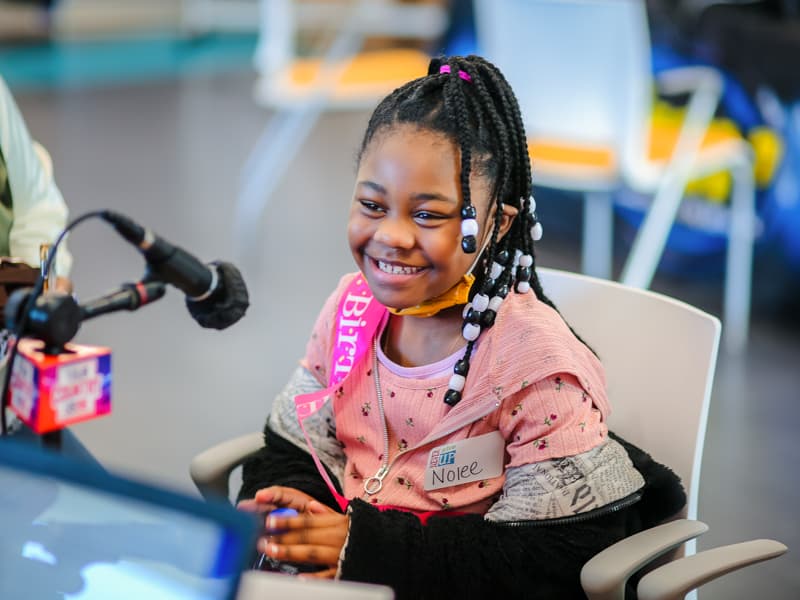 Wearing a birthday sash, Nolee Jones of Pearl smiles during the first day of the 2021 Mississippi Miracles Radiothon. Nolee is the state's 2022 Children's Miracle Network Hospitals Champion.