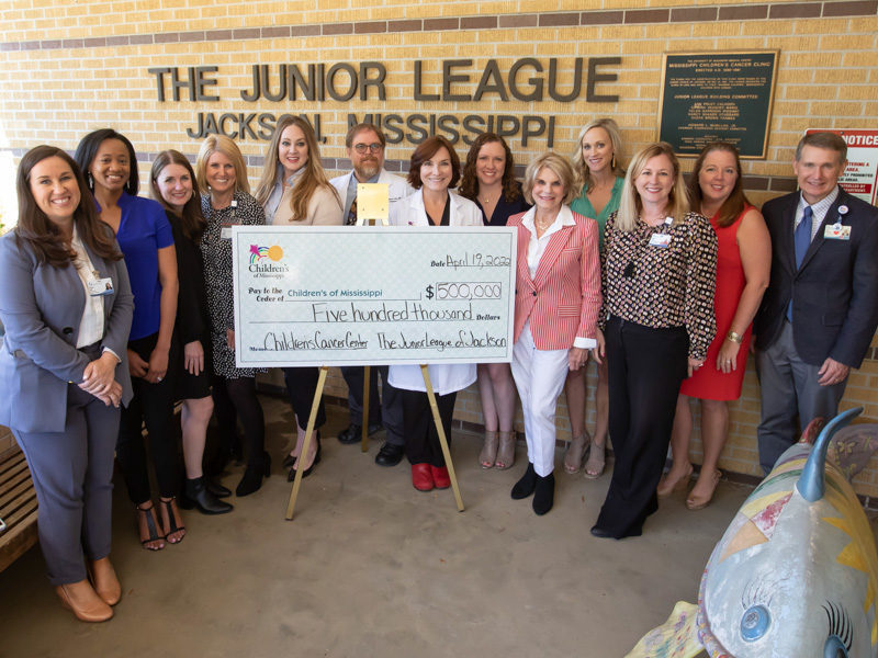 Celebrating a $500,000 gift from the Junior League of Jackson to the Center for Cancer and Blood Disorders at Children's of Mississippi are, from left, Suzanne Crell, UMMC major gifts officer; JLJ members Shalon Wansley and Molly Griffin; Meredith Aldridge, UMMC executive director of development; JLJ President Katie Lightsey Browning; Collier, Dr. Mary Taylor, Suzan B. Thames Chair and professor of pediatrics; JLJ President-elect Bethany Smith; Suzan Thames, an early supporter of the center; JLJ Communications Vice President Kaitlyn Vassar; Melanie Hataway, UMMC operations and stewardship officer; Jane Harkins, UMMC planned giving officer; and Children's of Mississippi CEO Guy Giesecke. Melanie Thortis/ UMMC Communications