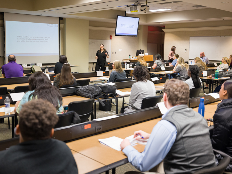 Cadi Thompson-Appleby, front center, leads a Communication with H.E.A.R.T. training session. Joe Ellis/ UMMC Communications