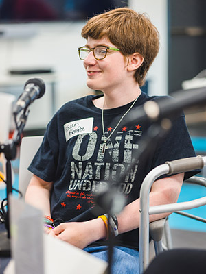 Evan Renfroe of Lena, who has grown up with spina bifida care from Children's of Mississippi, smiles during a radio interview.
