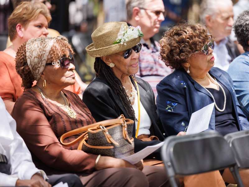 Wilma E. Clopton of Jackson, center, wife of body donor William Clopton, listens to the roll call with several of her friends; she is flanked by Dr. Corrine Anderson , left, and Flonzie Brownwright, both of Jackson.