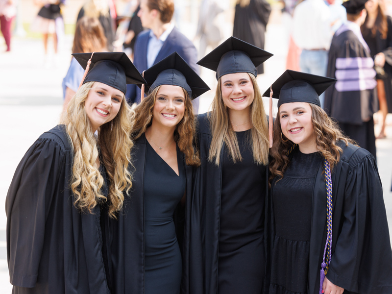 Posing for a photo at commencement were, from left, traditional BSN graduates Anna Grace Gill, Mallory Alford, Anna Payton McMillian and April Lawler. Joe Ellis/ UMMC Communications 