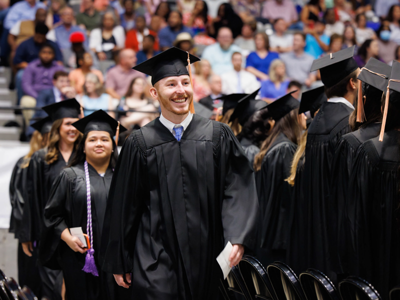 Cannon Mock is elated at the prospect of receiving his Bachelor of Science in Nursing. Joe Ellis/ UMMC Communications