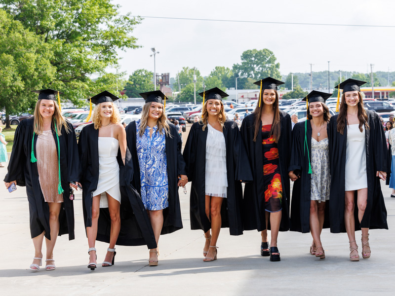 School of Health Related Professions graduates arrive at the 2024 UMMC Commencement together. They are, from left, Mallory Irby, Jordan Pritchard, Presley Brewer, Taylor Gregory, Aryn Greer, Lakin Hamm and Emily Bull. All received the Bachelor of Science in Radiologic Sciences. Jay Ferchaud/ UMMC Communications 