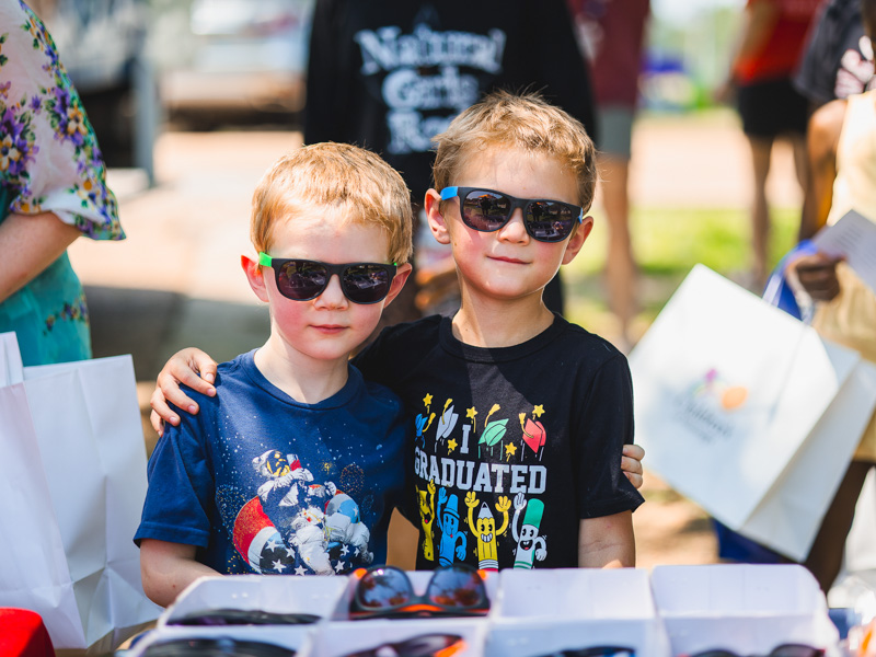 Call and Castor Cowart wear their Children's of Mississippi sunglasses on a sunny Saturday.