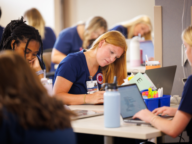 Avery Wolf is among UMMC nursing students taking notes during the first day of traditional BSN classes in Oxford.