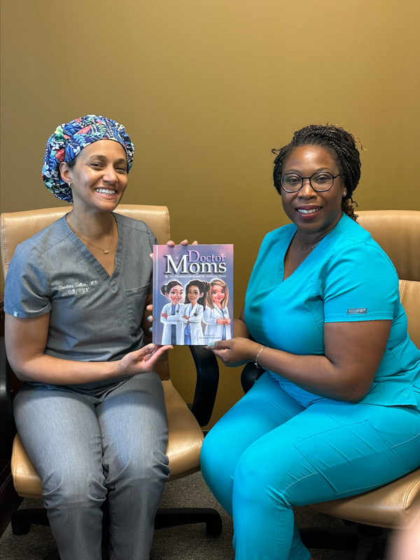Dr. Charlene Collier, left, a Jackson-area ob-gyn, and Pierre proudly display their Mother's Day delivery. (Photo courtesy of Dr. Ardarian Pierre)