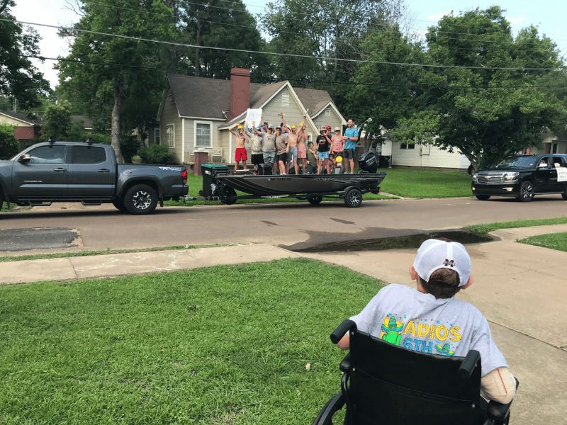 Osburn watches as community members welcomed him home from the hospital with a parade in his honor.