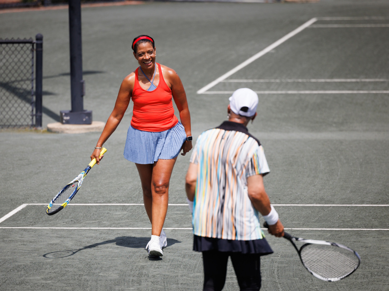 Clay shares a laugh with her doubles partner, Dr. Louise Jones of Jackson.