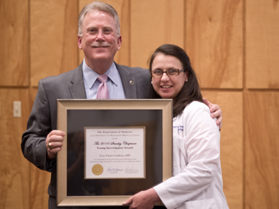 In this file photo, Yanes accepts the 2016 Stanley Chapman Young Investigator Award from Dr. Gailen Marshall, who is now the R. Faser Triplett Sr. MD Chair in Allergy and Immunology and the vice chair for research at UMMC. During her acceptance speech, Yanes dedicated the award to her grandmother.